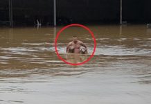 ЦЕЛА СРБИЈА СЕ ДИВИ ОВОМ МОМКУ: Погледајте драматичне фотографије спасавања из потопљене Гуче (ФОТО)