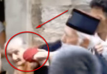 ИСПЛИВАО СНИМАК: Први човек такозване Црногорске православне цркве бије жену! (УЗНЕМИРУЈУЋИ ВИДЕО) Фото: Youtube printscreen