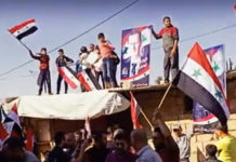 СИРИЈСКИ НАРОД У АЛЕПУ УСТАО ПРОТИВ ТУРАКА! Националне заставе дигнуте високо (ФОТО) (ВИДЕО) Фото: Youtube printscreen